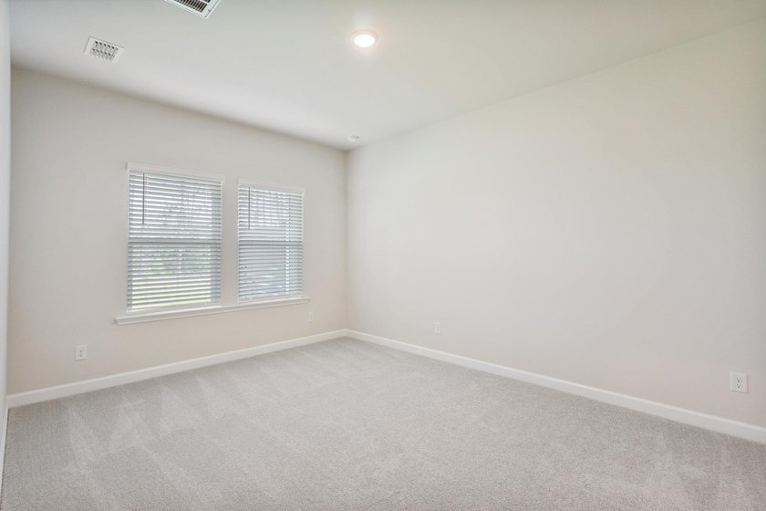 This beautifully designed 3 bedroom, 3 full bath townhome-style - photo 35