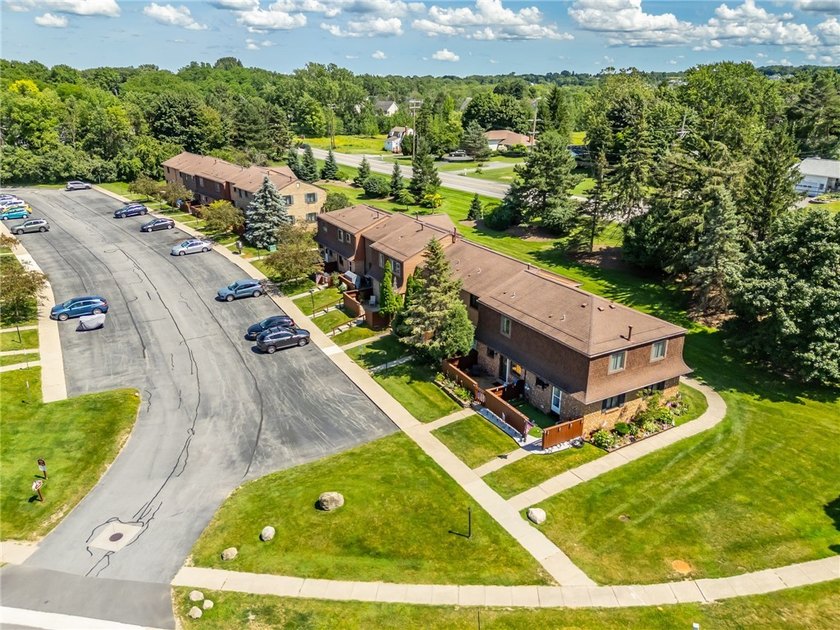 Move-in ready, low-maintenance living awaits! Welcome to 8 - photo 23