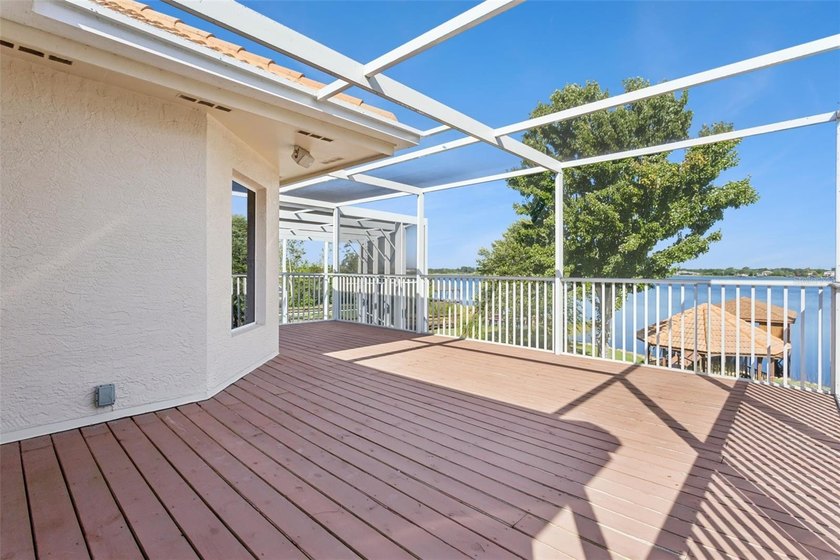 Experience exceptional lakefront living in this custom-built - photo 34
