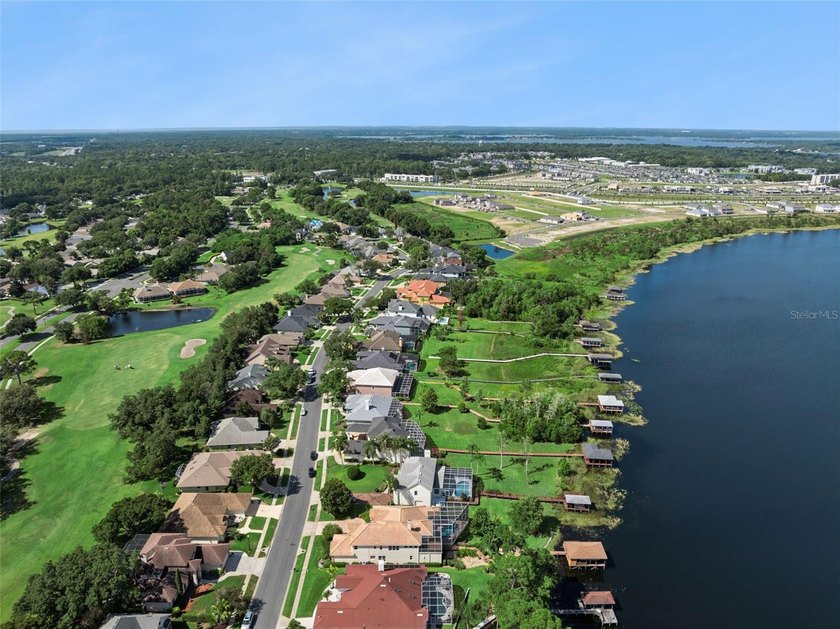 Experience exceptional lakefront living in this custom-built - photo 48