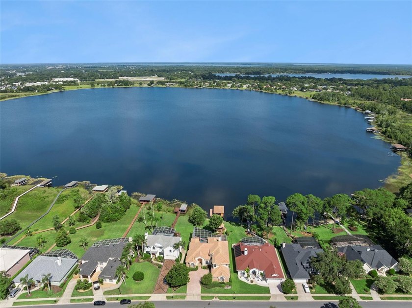 Experience exceptional lakefront living in this custom-built - photo 49