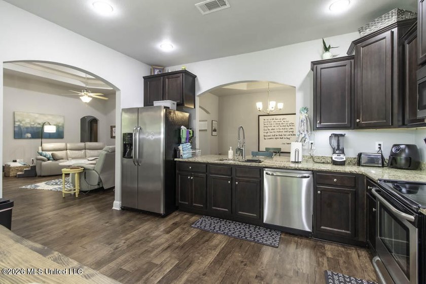 Better than new! This beautiful home sits in the coveted - photo 8