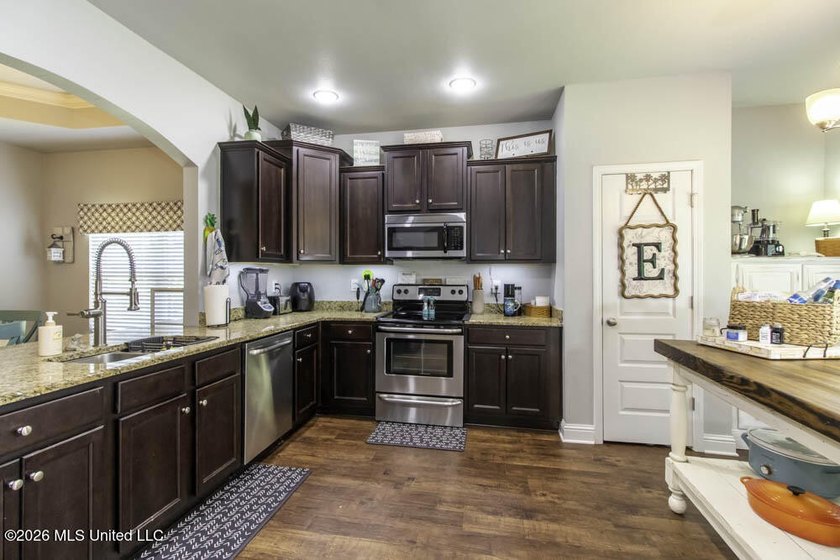 Better than new! This beautiful home sits in the coveted - photo 9