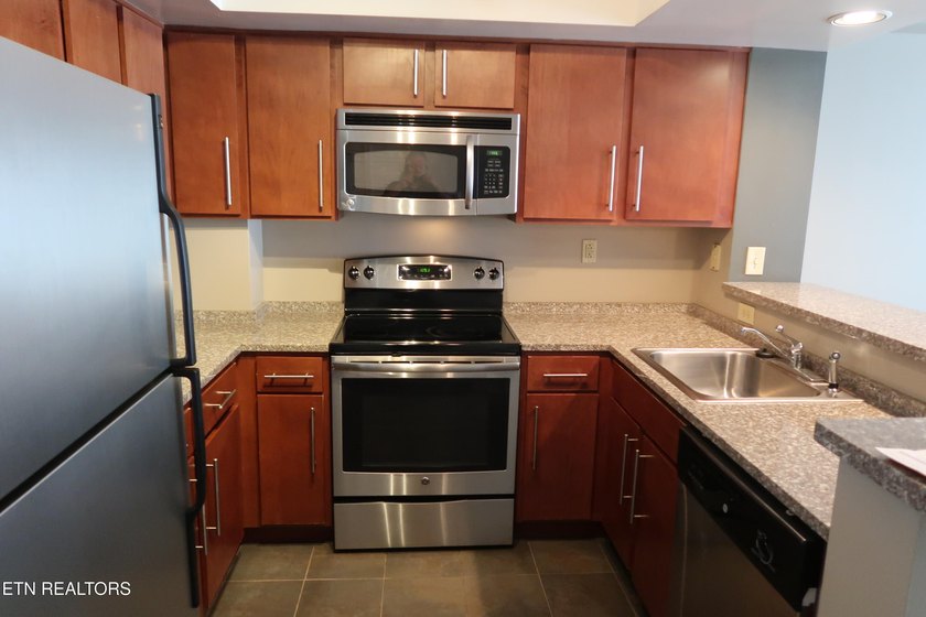 First Floor, 3 bedroom, 2 bath condo is across the street from - photo 3
