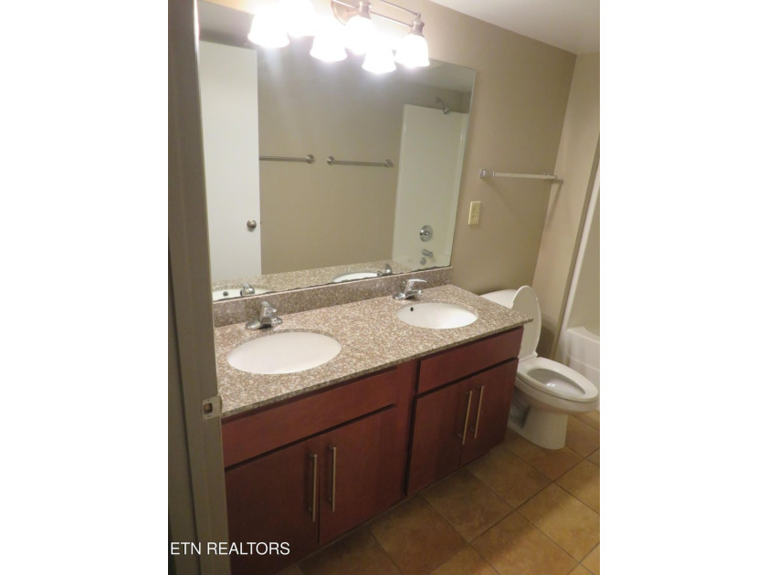 First Floor, 3 bedroom, 2 bath condo is across the street from - photo 5