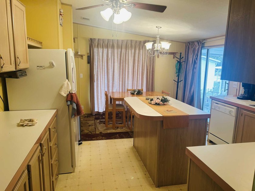 This well-furnished double wide home is perfectly situated on a - photo 2