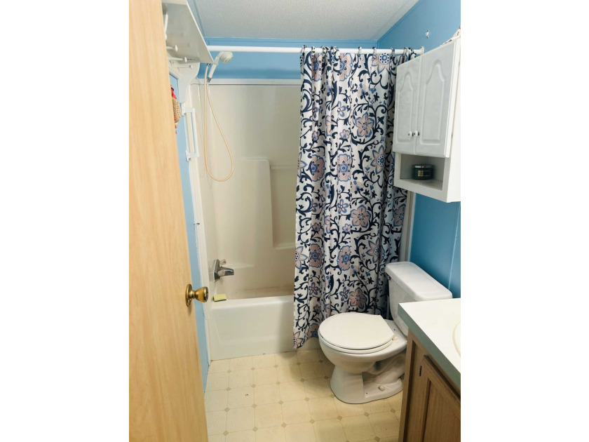 This well-furnished double wide home is perfectly situated on a - photo 6