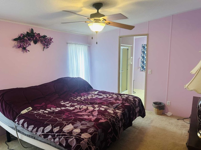 This well-furnished double wide home is perfectly situated on a - photo 8