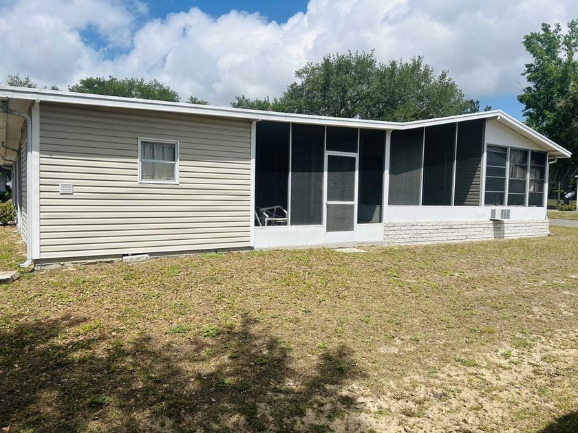 This well-furnished double wide home is perfectly situated on a - photo 10