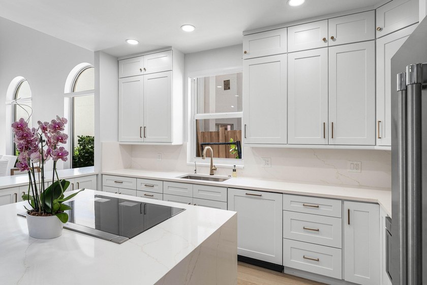 Completely renovated, this beautifully reimagined residence - photo 8