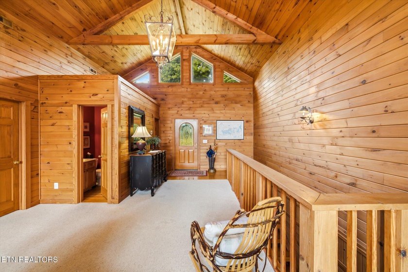 Stunning log home on the main channel of Douglas Lake! This - photo 5