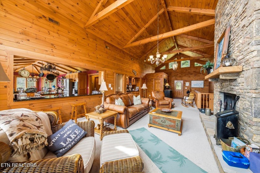 Stunning log home on the main channel of Douglas Lake! This - photo 9