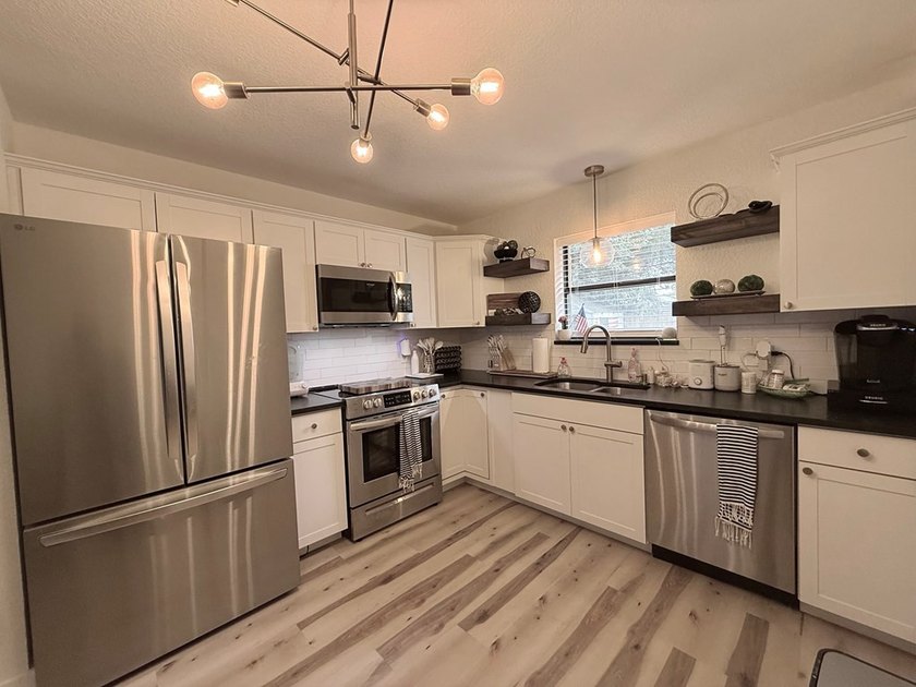 Cute as a Button! UPDATED &amp; REMODELED, move in ready, no city - photo 12