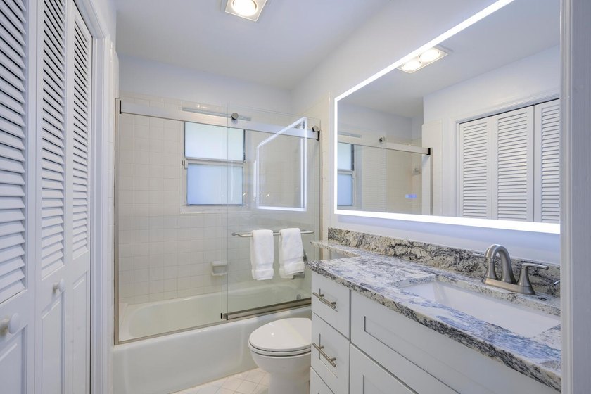 This beautiful home boasts two bedrooms and two baths, with the - photo 11