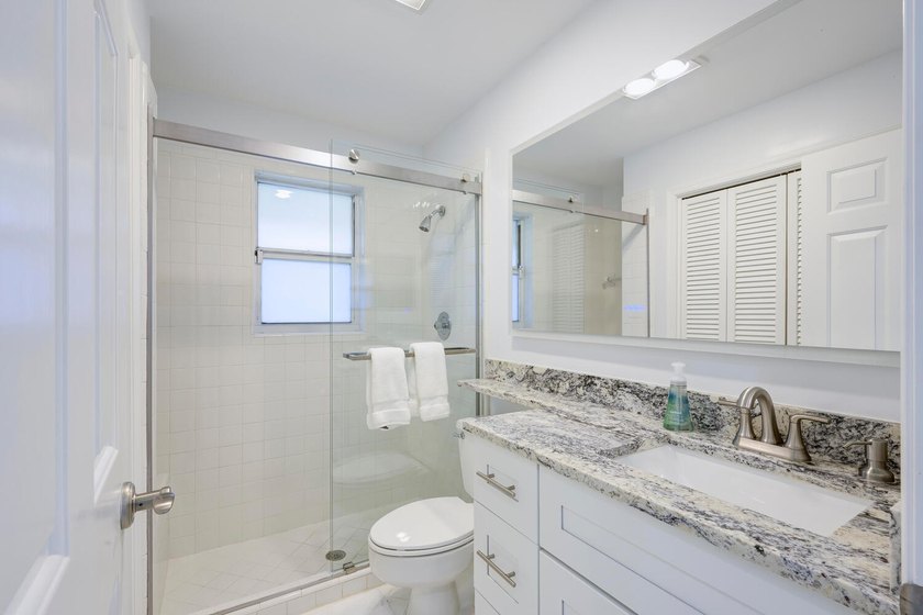This beautiful home boasts two bedrooms and two baths, with the - photo 14