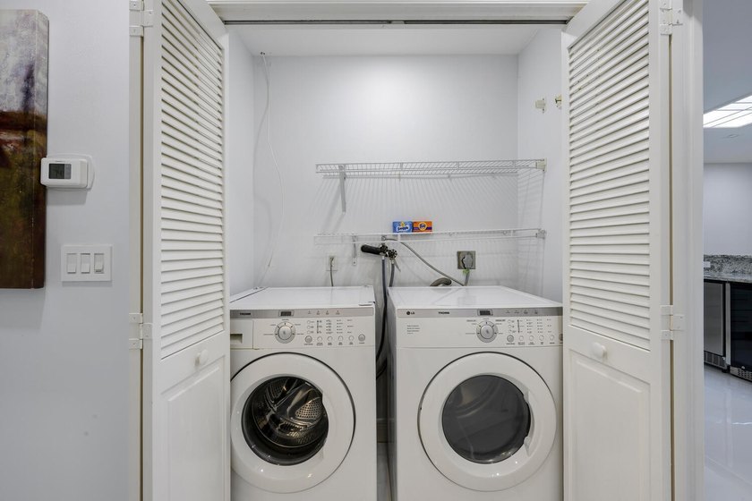 This beautiful home boasts two bedrooms and two baths, with the - photo 15