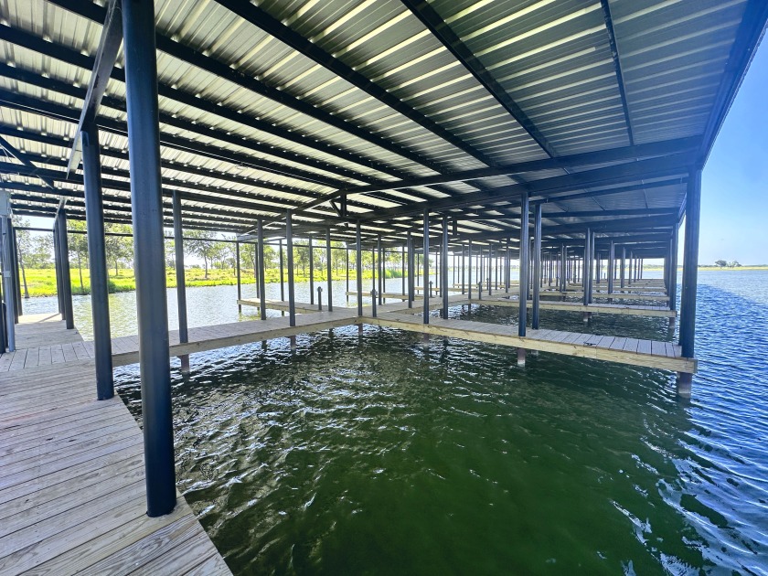 300+ feet of shoreline on Lake Halbert/Magnolia! - photo 31