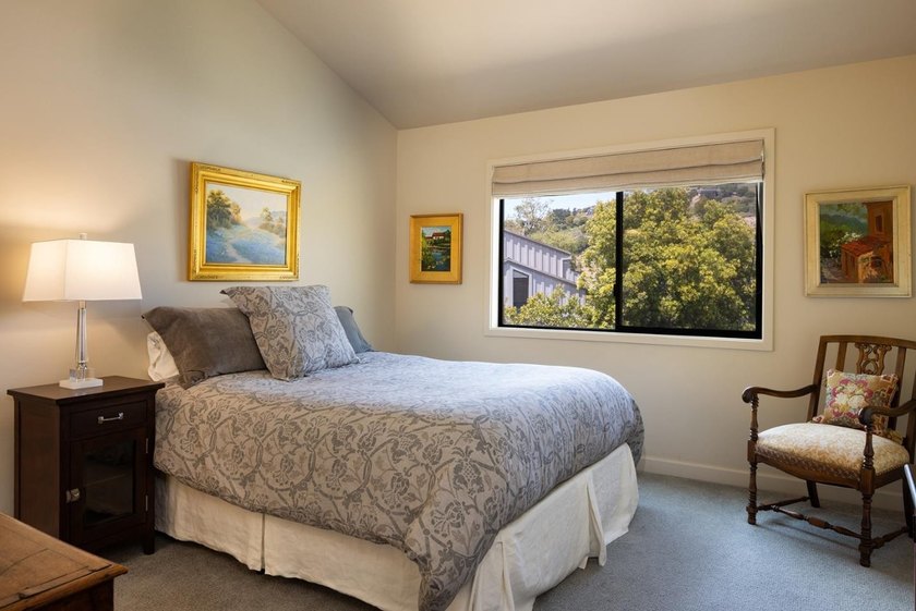 This exquisitely updated townhome enjoys privacy, sunshine, and - photo 23