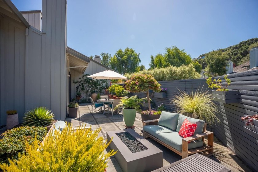 This exquisitely updated townhome enjoys privacy, sunshine, and - photo 36