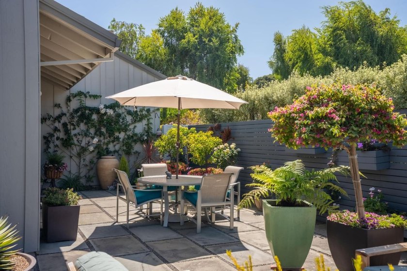 This exquisitely updated townhome enjoys privacy, sunshine, and - photo 37