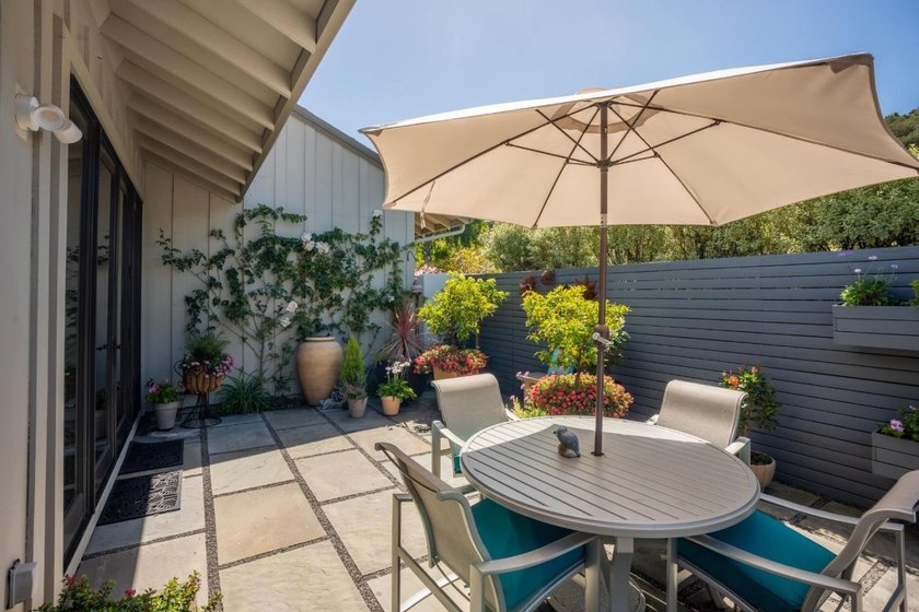 This exquisitely updated townhome enjoys privacy, sunshine, and - photo 41