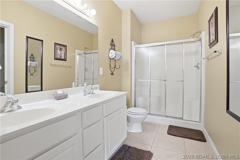 This spacious 5-bedroom, 3-bathroom two-story condo located in - photo 12