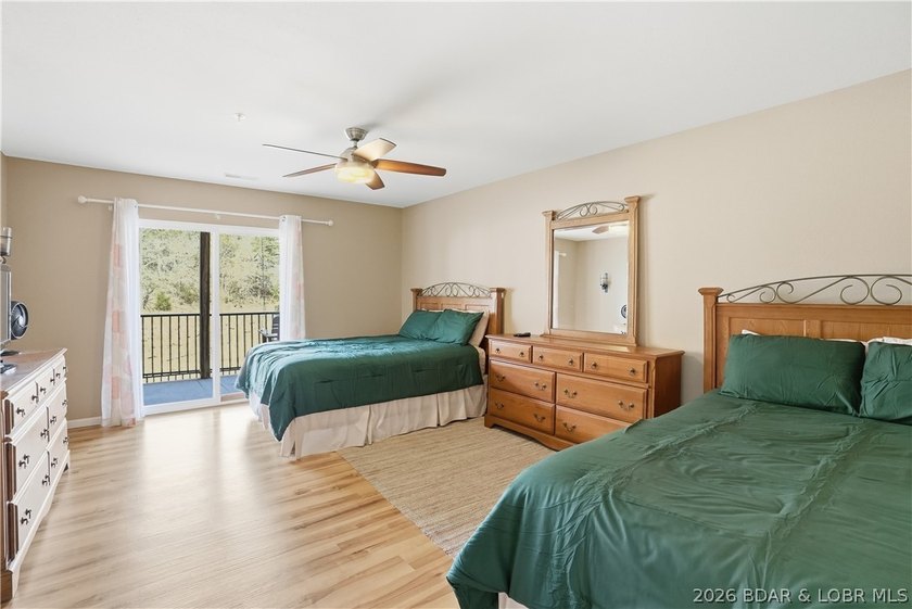 This spacious 5-bedroom, 3-bathroom two-story condo located in - photo 23