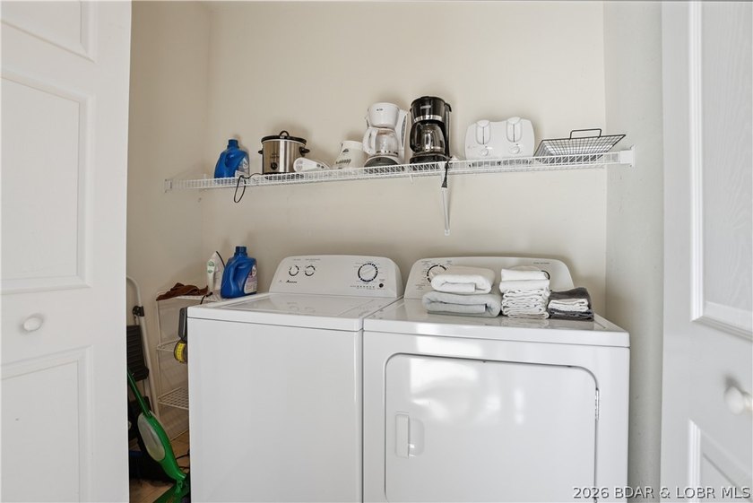 This spacious 5-bedroom, 3-bathroom two-story condo located in - photo 27