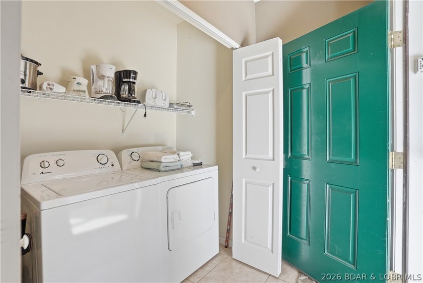 This spacious 5-bedroom, 3-bathroom two-story condo located in - photo 28