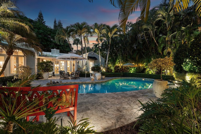 Tucked behind an arched gate on one of Palm Trail's most coveted - photo 7