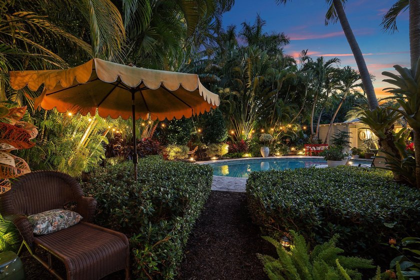 Tucked behind an arched gate on one of Palm Trail's most coveted - photo 9