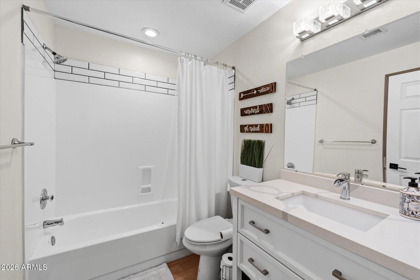 Thoughtfully renovated 2-bed, 2-bath condo in the guard-gated - photo 13
