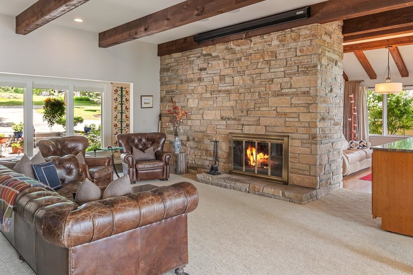 This 4-bedroom, 3-bath midcentury lake home offers 100 feet of - photo 11