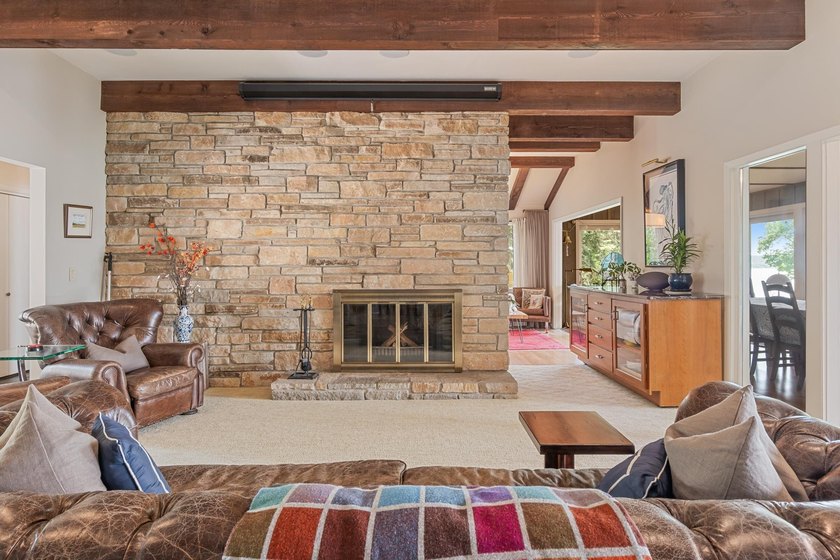 This 4-bedroom, 3-bath midcentury lake home offers 100 feet of - photo 12