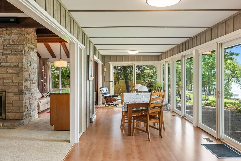 This 4-bedroom, 3-bath midcentury lake home offers 100 feet of - photo 17