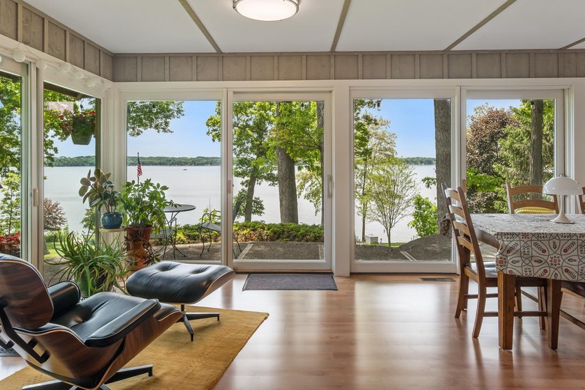 This 4-bedroom, 3-bath midcentury lake home offers 100 feet of - photo 19