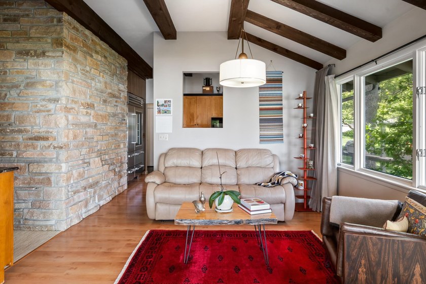 This 4-bedroom, 3-bath midcentury lake home offers 100 feet of - photo 21