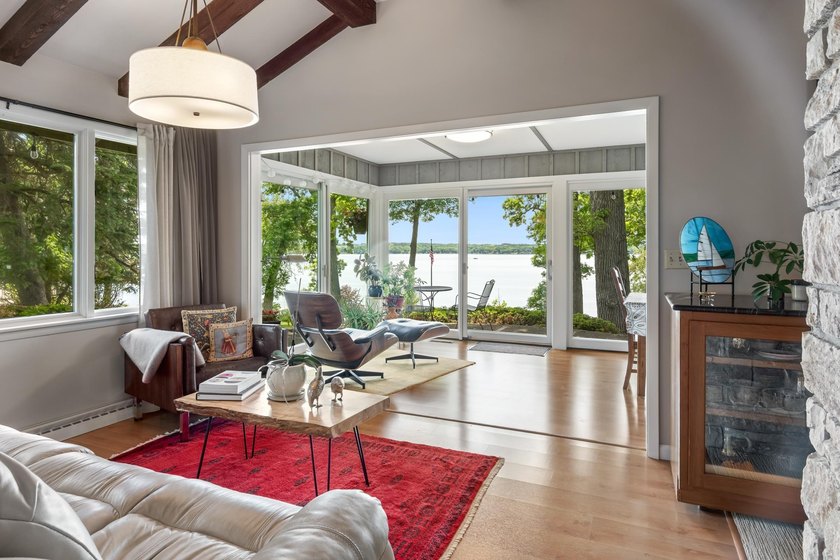 This 4-bedroom, 3-bath midcentury lake home offers 100 feet of - photo 22