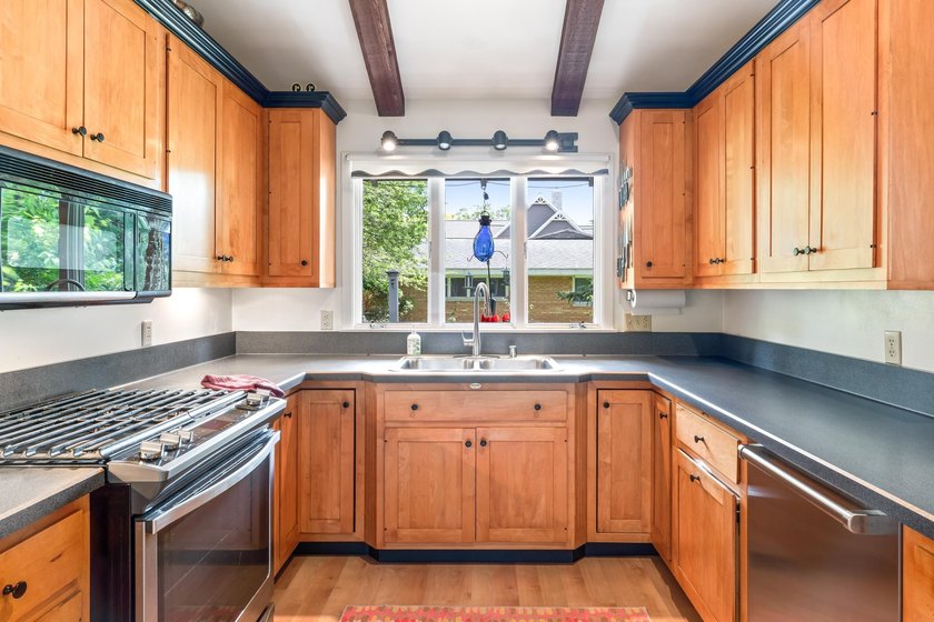 This 4-bedroom, 3-bath midcentury lake home offers 100 feet of - photo 26