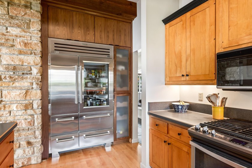 This 4-bedroom, 3-bath midcentury lake home offers 100 feet of - photo 27