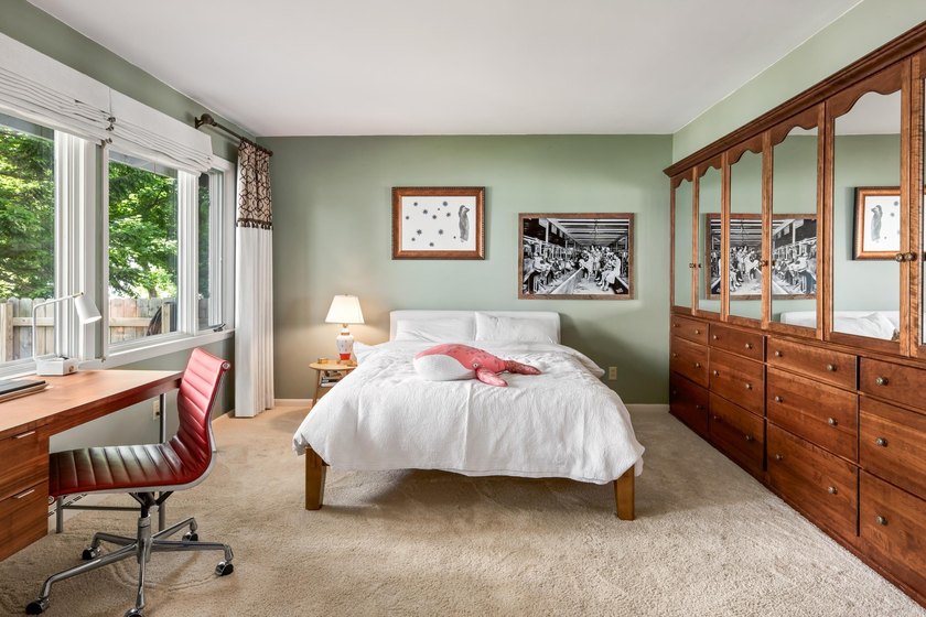 This 4-bedroom, 3-bath midcentury lake home offers 100 feet of - photo 28