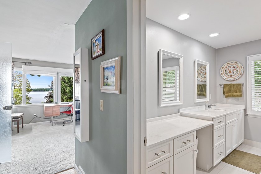 This 4-bedroom, 3-bath midcentury lake home offers 100 feet of - photo 31