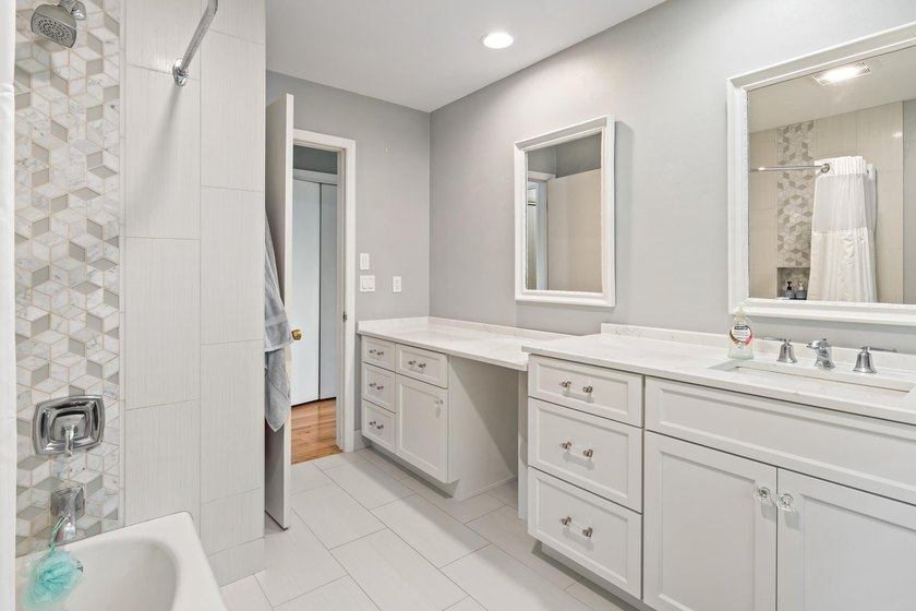 This 4-bedroom, 3-bath midcentury lake home offers 100 feet of - photo 32