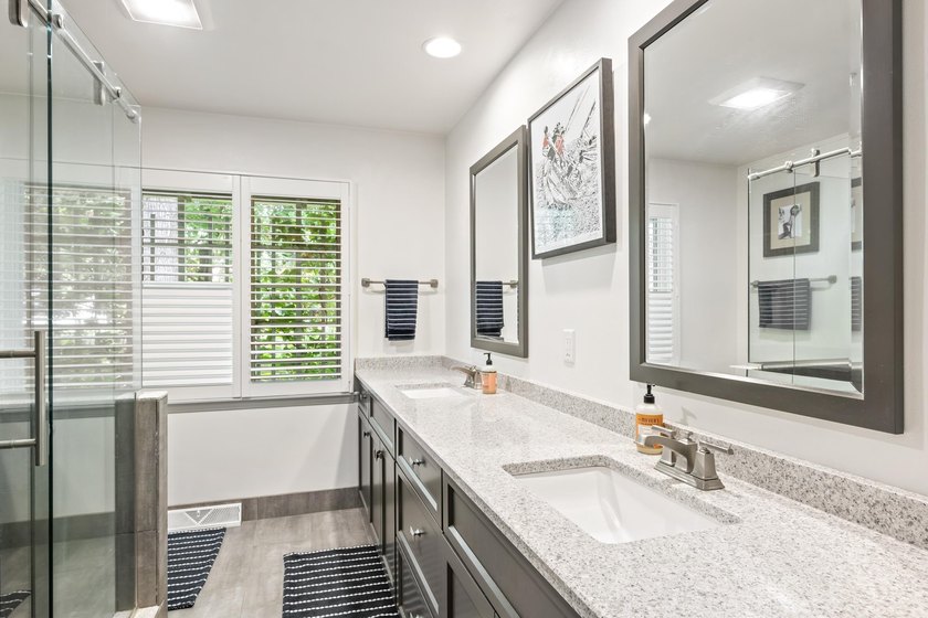 This 4-bedroom, 3-bath midcentury lake home offers 100 feet of - photo 35