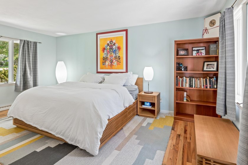 This 4-bedroom, 3-bath midcentury lake home offers 100 feet of - photo 39
