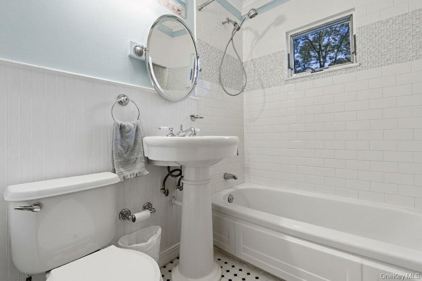 Welcome to this charming 4-bedroom, 2-bath home nestled in the - photo 11