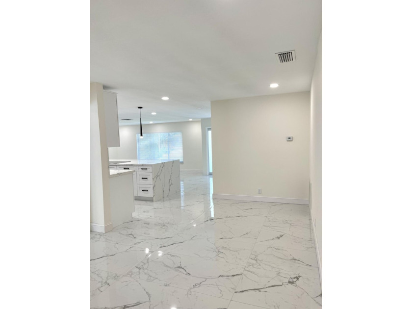 Completely renovated 4-bedroom, 2-bath home with a stunning - photo 10