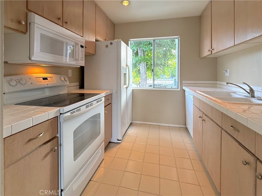 Rarely Available 2-bed 2-bath home near the scenic Village on - photo 3