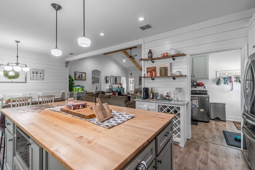 Charming Coastal Farmhouse on 1/2 Acre with Pond in Coveted - photo 7