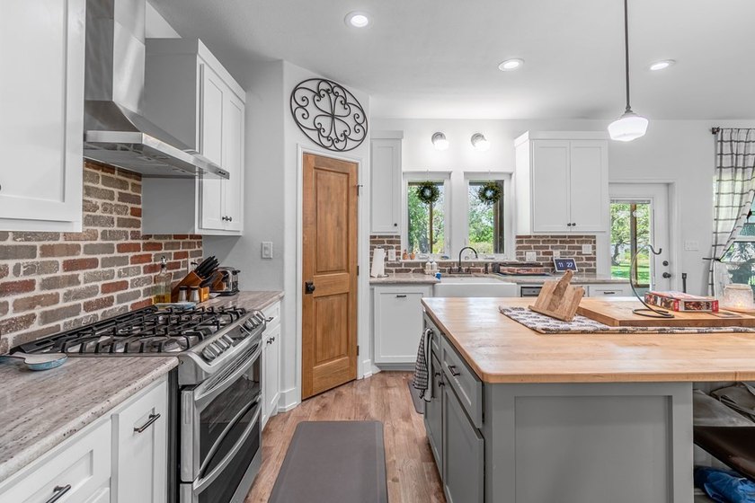 Charming Coastal Farmhouse on 1/2 Acre with Pond in Coveted - photo 8